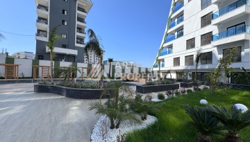 Квартира 1+1 с большим балконом в новом доме, 60 кв.м. Махмутлар, Алания - Ракурс 21