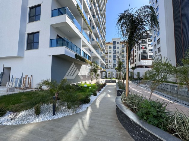 Квартира 1+1 с большим балконом в новом доме, 60 кв.м. Махмутлар, Алания - Ракурс 21