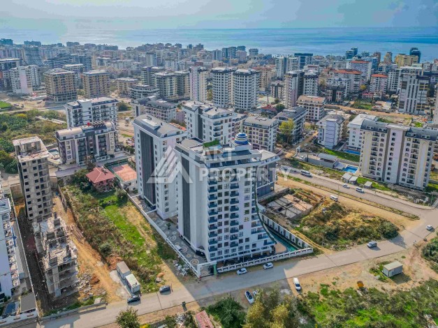 Квартира 1+1 с большим балконом в новом доме, 60 кв.м. Махмутлар, Алания - Ракурс 29