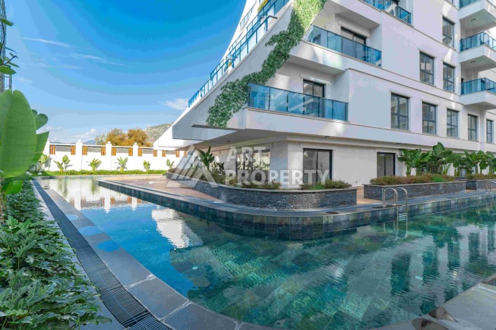 Квартира 1+1 с большим балконом в новом доме, 60 кв.м. Махмутлар, Алания - Ракурс 40