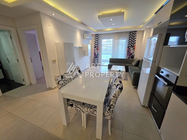 Квартира 1+1 с большим балконом в Махмутларе, всего 350 м до моря - Ракурс 4