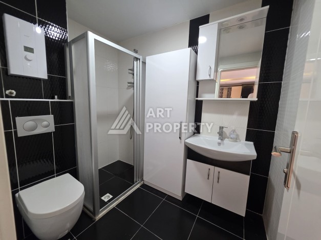 Квартира 1+1 с большим балконом в Махмутларе, всего 350 м до моря - Ракурс 7