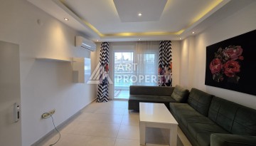 Квартира 1+1 с большим балконом в Махмутларе, всего 350 м до моря - Ракурс 9