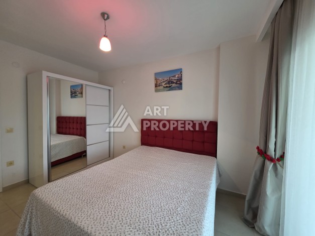 Квартира 1+1 с большим балконом в Махмутларе, всего 350 м до моря - Ракурс 10