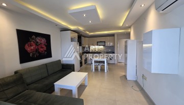 Квартира 1+1 с большим балконом в Махмутларе, всего 350 м до моря - Ракурс 12