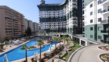 Квартира 1+1 в элитной резиденции, 55 кв.м. Махмутлар, Алания - Ракурс 1