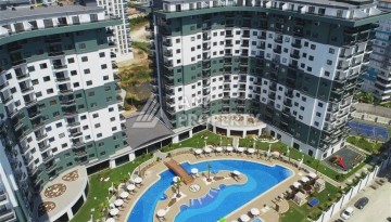 Квартира 1+1 в элитной резиденции, 55 кв.м. Махмутлар, Алания - Ракурс 8