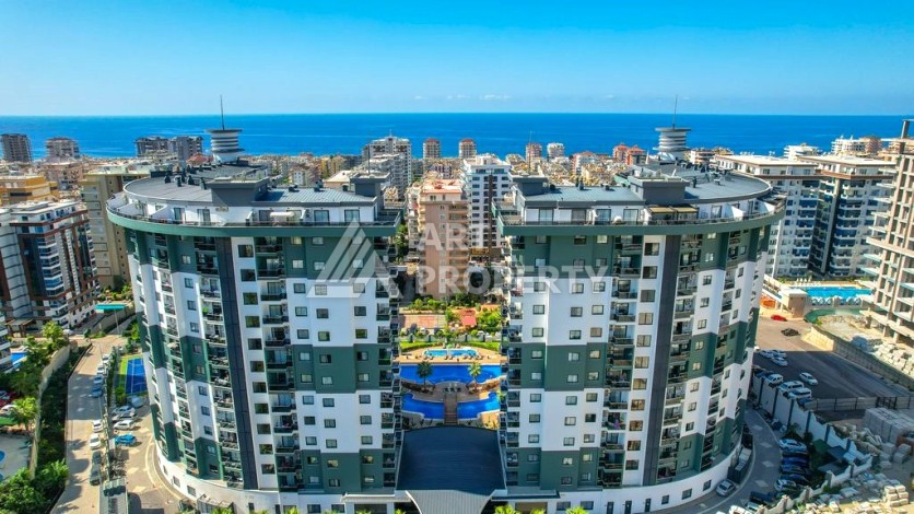 Квартира 1+1 в элитной резиденции, 55 кв.м. Махмутлар, Алания - Ракурс 21