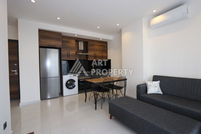 Квартира 1+1 в элитной резиденции, 55 кв.м. Махмутлар, Алания - Ракурс 24