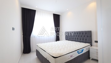 Квартира 1+1 в элитной резиденции, 55 кв.м. Махмутлар, Алания - Ракурс 27