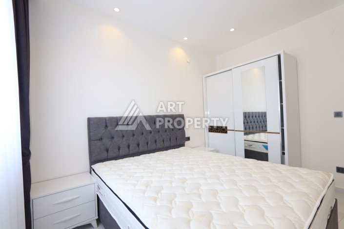 Квартира 1+1 в элитной резиденции, 55 кв.м. Махмутлар, Алания - Ракурс 28