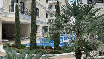 Квартира 1+1 в бутик-комплексе с лицензией на краткосрочную аренду в районе пляжа Клеопатры - Ракурс 1