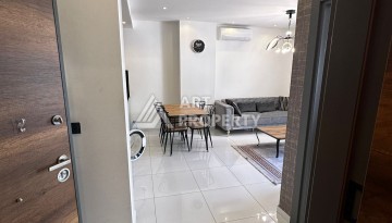 Стильная меблированная квартира 1+1 с видом на бассейн в элитной резиденции Махмутлара, 55 кв.м. - Ракурс 5