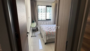 Стильная меблированная квартира 1+1 с видом на бассейн в элитной резиденции Махмутлара, 55 кв.м. - Ракурс 8