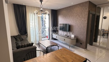 Стильная меблированная квартира 1+1 с видом на бассейн в элитной резиденции Махмутлара, 55 кв.м. - Ракурс 10