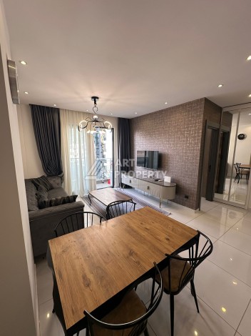 Стильная меблированная квартира 1+1 с видом на бассейн в элитной резиденции Махмутлара, 55 кв.м. - Ракурс 9