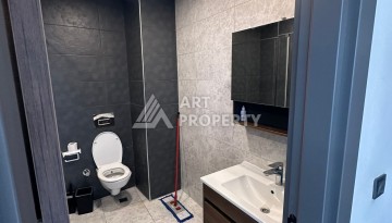 Стильная меблированная квартира 1+1 с видом на бассейн в элитной резиденции Махмутлара, 55 кв.м. - Ракурс 13