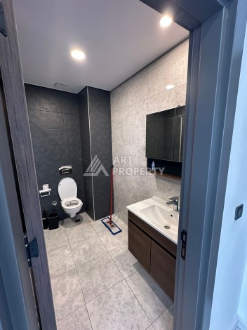 Стильная меблированная квартира 1+1 с видом на бассейн в элитной резиденции Махмутлара, 55 кв.м. - Ракурс 12