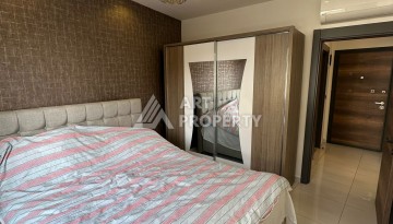 Стильная меблированная квартира 1+1 с видом на бассейн в элитной резиденции Махмутлара, 55 кв.м. - Ракурс 14