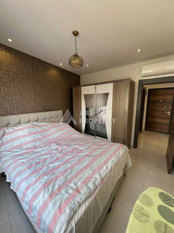 Стильная меблированная квартира 1+1 с видом на бассейн в элитной резиденции Махмутлара, 55 кв.м. - Ракурс 13