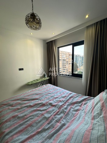 Стильная меблированная квартира 1+1 с видом на бассейн в элитной резиденции Махмутлара, 55 кв.м. - Ракурс 14