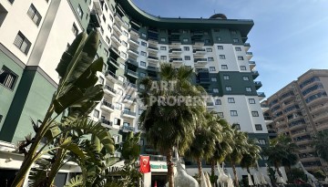 Стильная меблированная квартира 1+1 с видом на бассейн в элитной резиденции Махмутлара, 55 кв.м. - Ракурс 17