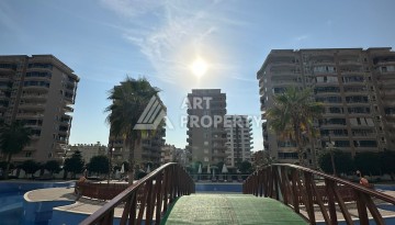 Стильная меблированная квартира 1+1 с видом на бассейн в элитной резиденции Махмутлара, 55 кв.м. - Ракурс 19