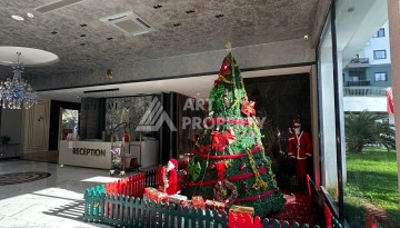 Стильная меблированная квартира 1+1 с видом на бассейн в элитной резиденции Махмутлара, 55 кв.м. - Ракурс 21