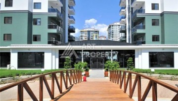 Стильная меблированная квартира 1+1 с видом на бассейн в элитной резиденции Махмутлара, 55 кв.м. - Ракурс 23