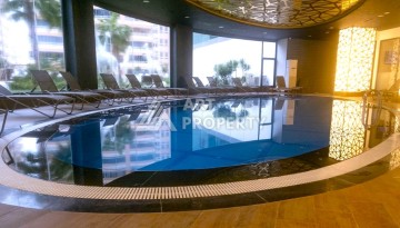 Стильная меблированная квартира 1+1 с видом на бассейн в элитной резиденции Махмутлара, 55 кв.м. - Ракурс 25