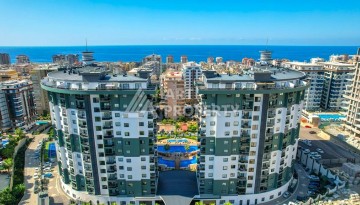 Стильная меблированная квартира 1+1 с видом на бассейн в элитной резиденции Махмутлара, 55 кв.м. - Ракурс 37