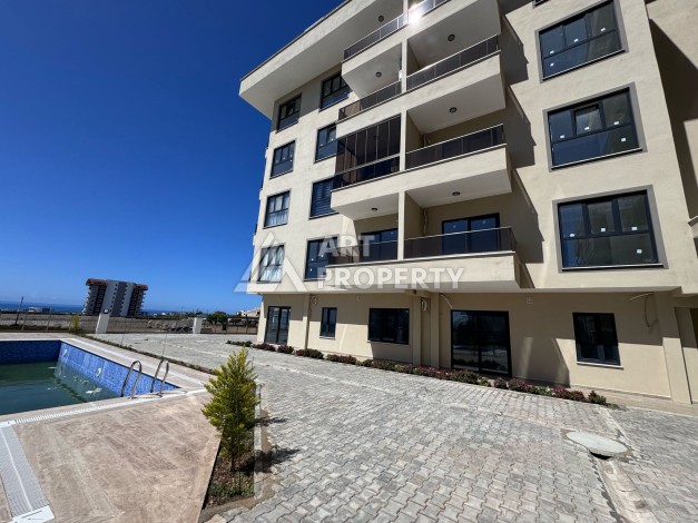 Квартира 1+1 с видом на море, 45 кв.м. Паяллар, Алания - Ракурс 11