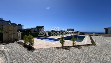 Квартира 1+1 с видом на море, 45 кв.м. Паяллар, Алания - Ракурс 16