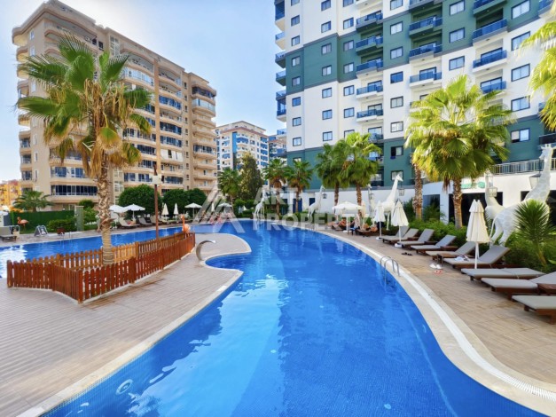 Меблированная квартира 1+1 в одном из лучших ЖК, 55 кв.м. Махмутлар, Алания - Ракурс 1