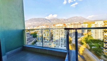 Меблированная квартира 1+1 в одном из лучших ЖК, 55 кв.м. Махмутлар, Алания - Ракурс 32