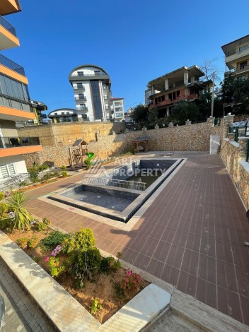 Квартира 1+1 в новом ЖК, 55 кв.м. Оба, Алания - Ракурс 10