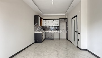 Кварти ра 1+1 в новом доме, 55 кв.м. Махмутлар, Алания. - Ракурс 1