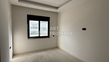 Кварти ра 1+1 в новом доме, 55 кв.м. Махмутлар, Алания. - Ракурс 2