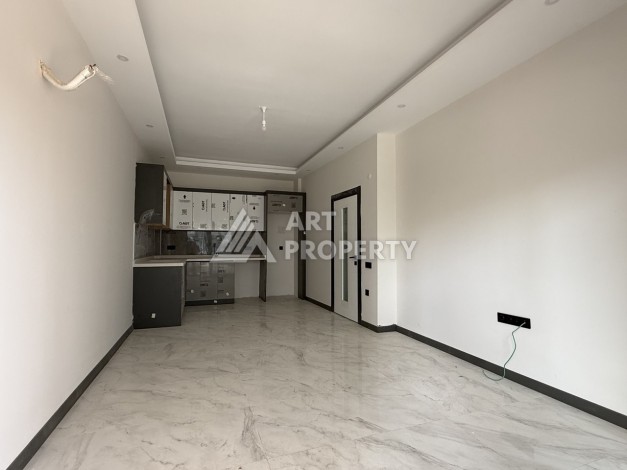 Кварти ра 1+1 в новом доме, 55 кв.м. Махмутлар, Алания. - Ракурс 2