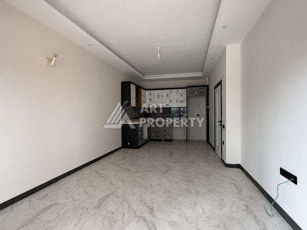 Кварти ра 1+1 в новом доме, 55 кв.м. Махмутлар, Алания. - Ракурс 3