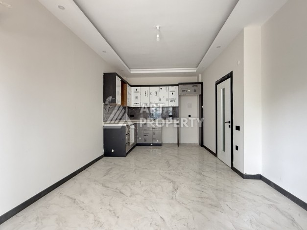 Кварти ра 1+1 в новом доме, 55 кв.м. Махмутлар, Алания. - Ракурс 4