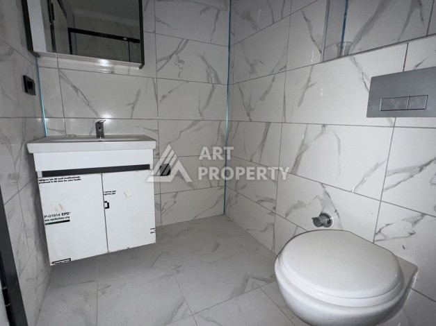 Кварти ра 1+1 в новом доме, 55 кв.м. Махмутлар, Алания. - Ракурс 12