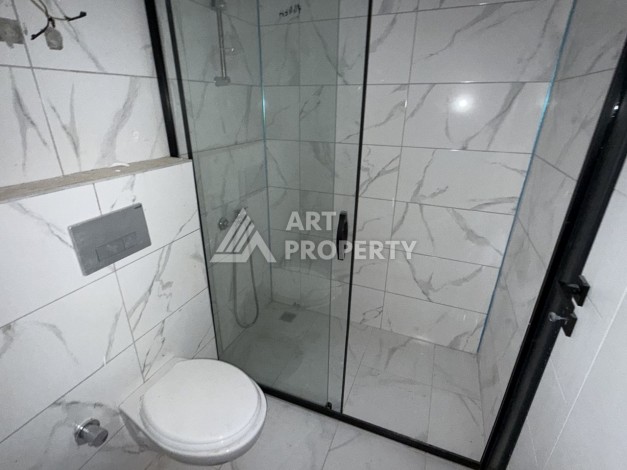 Кварти ра 1+1 в новом доме, 55 кв.м. Махмутлар, Алания. - Ракурс 13