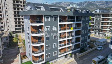 Кварти ра 1+1 в новом доме, 55 кв.м. Махмутлар, Алания. - Ракурс 20