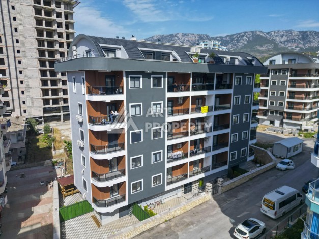 Кварти ра 1+1 в новом доме, 55 кв.м. Махмутлар, Алания. - Ракурс 19