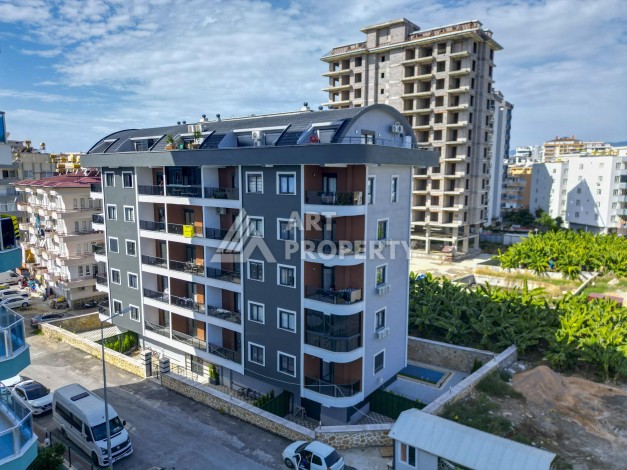 Кварти ра 1+1 в новом доме, 55 кв.м. Махмутлар, Алания. - Ракурс 20