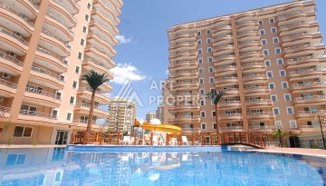 Просторная квартира 2+1 в центре Махмутлара, всего 400 м до моря. - Ракурс 1