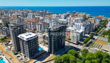 Квартира 2+1 в 400 метрах от моря в Махмутларе. Есть вид на море - Ракурс 1