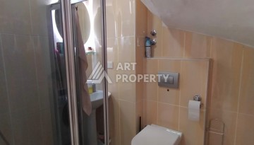 Дуплекс 3+1 с видом на море в Махмутларе, 150 кв.м. - Ракурс 32