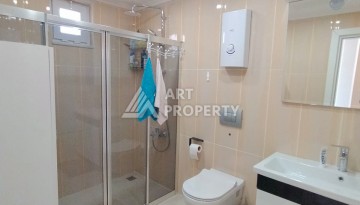 Дуплекс 3+1 с видом на море в Махмутларе, 150 кв.м. - Ракурс 33